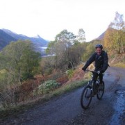 A tough climb but for this section at least, the smooth tarmac makes life that bit easier. The Pap of Glencoe is visible in the distance.