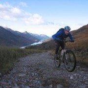 Loose rain washed gravel and a steep gradient make the climb tough going.