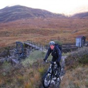 Crossing the dam at Loch Eilde Mor to start following the feed pipe all the way to Blackwater Reservoir.
