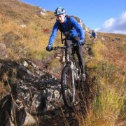 From the junction with the pipeline, the Ciaran Path drops sharply, and this upper section is the steepest and roughest. Mostly excellent biking, but before the giant death cookies.