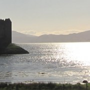 Castle Stalker viewed from the Sustrans Cycle Route on an early summer day.